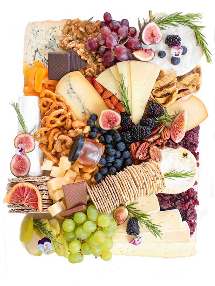 Cheeseboard with nuts flowers and Crackers